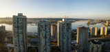 Fototapeta Miasta - Aerial view of Residential Buildings in the city during a vibrant sunrise. Taken in New Westminster, Greater Vancouver, British Columbia, Canada.