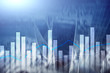 © Funtap - Financial graphs and charts on blurred business center background. Invesment and trading concept.