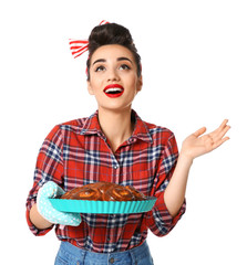 Poster - Funny young housewife with homemade pastry on white background