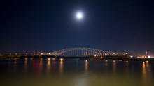Bridge At Night Over The Mighty Mississippi River Barges