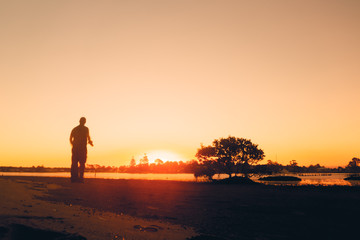 Human silhouette at sunset