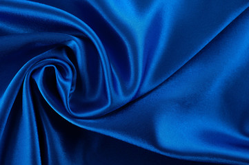 abstract silk luxury background, piece of cloth, deep blue cloth texture