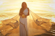 Beautiful girl in a long white wedding dress in Greek style is the old Greek goddess