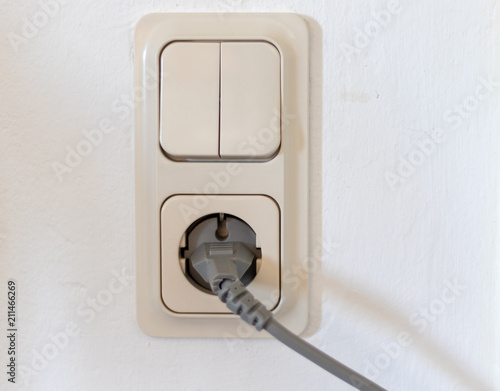 Double Light Switch And A Socker Inside In A House Buy This
