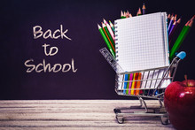Back To School And Education Shopping Concept. Classroom With Apple, Notebook And Colorful Pencils On Chalkboard Background. School Border With Copy Space