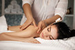© producer - Relaxed woman receiving massage
