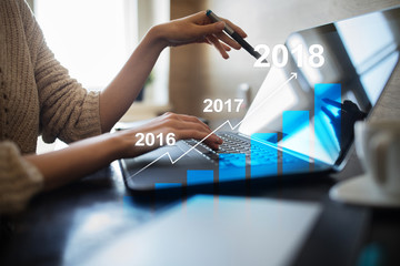 2018 year profit growth chart, Business, finance and investment concept on virtual screen. Goals setting on improvement.