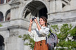 © Daxiao Productions - solo travel woman making memories on holiday european architecture
