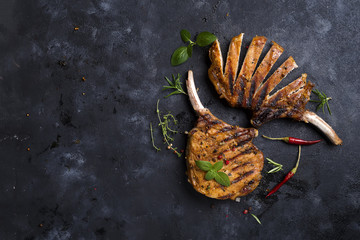 Poster - Grilled T-bone steak on stone table. Top view with copy space