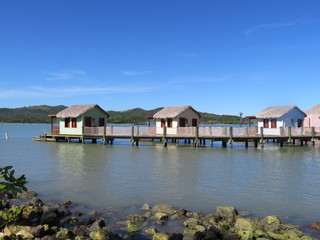 Wall Mural - Cabanas on the water in Amber Cove cruise port in Puerto Plata, Dominican Republic