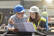 © goodluz - Metal industry manager and engineer meeting in factory