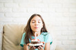 © AntonioDiaz - Picture of beautiful 10 year old girl with cake