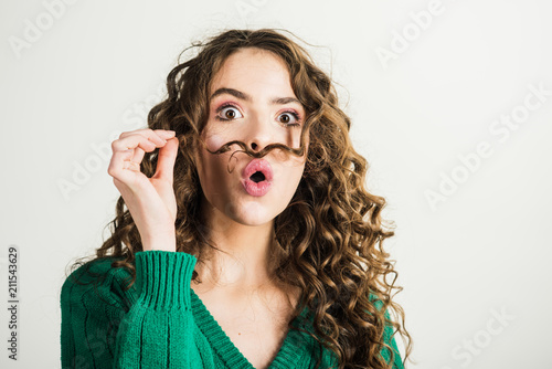 Portrait Of Cute Girl With Long Curly Hair On White Background