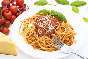 Canvas Print - spaghetti dish with bolognese sauce and basil leaf