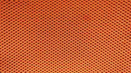 Orange nylon fabric pattern texture background.