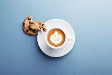 A Cup Of Coffee And American Cookies With Chocolate Chips On Grey Background. Top View.