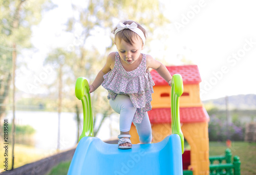 Fototapeta Kid enjoying in the playground