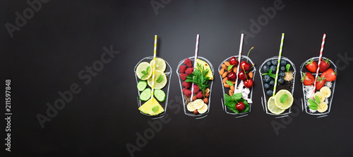 Fotomural Food ingredients for blending smoothie or juice on painted glass over black chalkboard