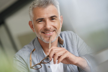 Middle-aged guy with trendy eyeglasses