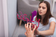 © Viacheslav Yakobchuk - Teen complex. Selective focus of pink inscription ugly on mirror and female hand getting rid of it