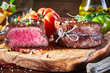 Tender medium rare beef fillet steak medallions