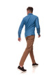 © Viorel Sima - rear view of casual man walking and looking to side