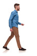 © Viorel Sima - side view of handsome casual man walking