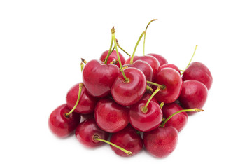 Wall Mural - ripe red cherries isolated in white background