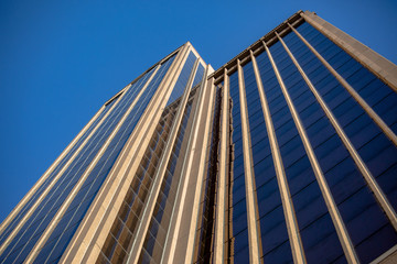 Skyscraper looking up in downtown