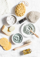 Wall Mural - spa accessories - nut scrub, sponge, facial brush, natural soap, clay face mask, pumice stone, essen