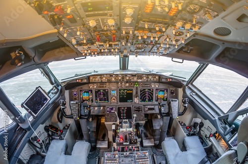 Cuadros en Lienzo Passenger aircraft interior, engine power control and other aircraft control unit in the cockpit of modern civil passenger airplane