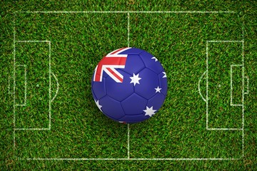 Canvas Print - Composite image of football in australia colours