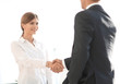 © ASDF - handshake young business woman with a colleague