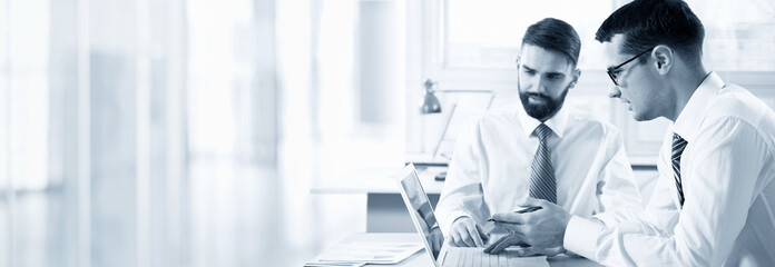 Wall Mural - Businessmen working in an office