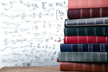 Poster - Stack of books on wooden table