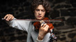 © Maestro7 - young guy playing the violin