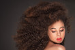 © neonshot - Beauty portrait of attractive woman in afro hairstyle.