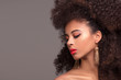 © neonshot - Beauty portrait of attractive woman in afro hairstyle.
