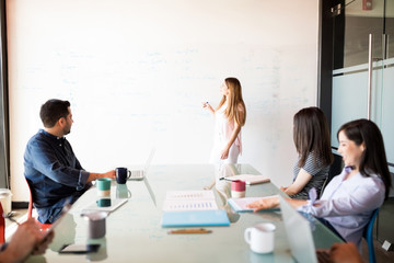 young woman giving business presentation