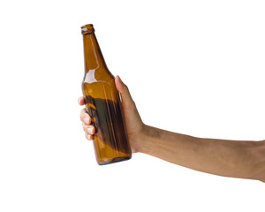 Wall Mural - Hand holding beer bottle isolated on white background. Clipping path of transparent brown bottle without label.