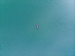 © phpetrunina14 - woman on mattress in azure water. overhead view. copy space