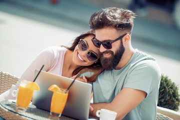 Wall Mural - Beautiful couple having coffee on a date