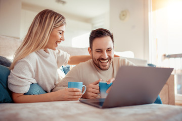 Poster - Cheerful couple enjoying at home