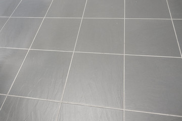 Wall Mural - grey textured slate rock big tile flooring with white grey cemenet grout