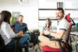 © AntonioDiaz - Man in a startup business meeting