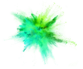 Explosion of coloured powder on white background