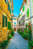 Fototapeta Uliczki - View of a narrow street in the spanish town Valldemossa at Mallorca