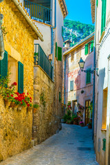 Wall Mural - View of a narrow street in the spanish town Valldemossa at Mallorca