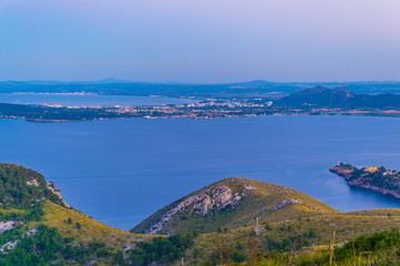 Poster - Sunset aerial view of Alcudia town situated between Pollenca and Alcudia bays, Mallorca, Spain