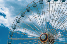 Ferris Wheel At Ocean CIty New Jersey Boardwalk With Blue Sky And Epic Clouds